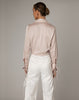 Cordella XI beautiful nude silky feel tailored open shirt featuring tie front ribbon and ribbon tie cuffs.